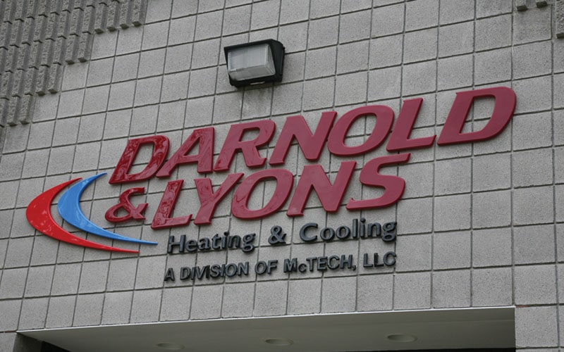 maroon and black formed plastic letters mounted flush outside for heating business