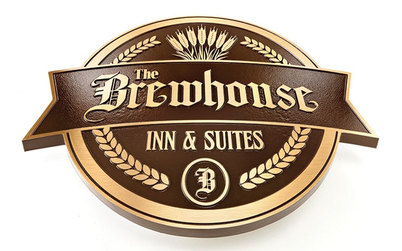 brushed cast bronze plaque with brown background for restaurant