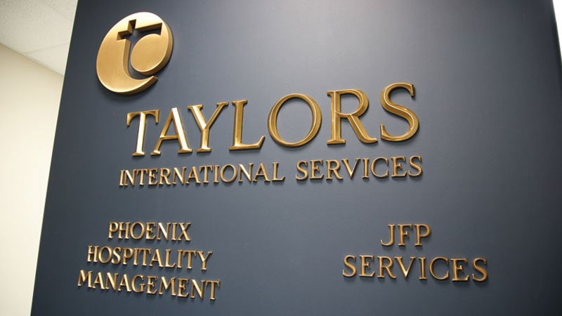 cast bronze letters in polished prismatic beveled face for lobby wall
