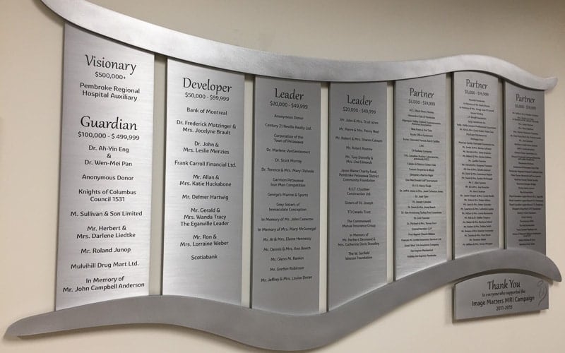 brushed etched stainless steel plaques with black text for commemorative donor wall