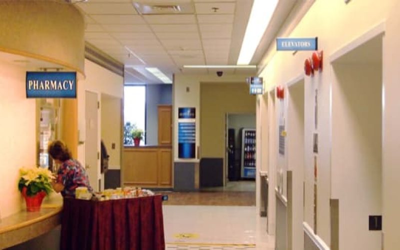 curved-projecting-sign-hallway-hospital.jpg