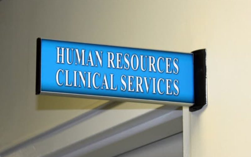 curved-projecting-sign-hospital-blue.jpg